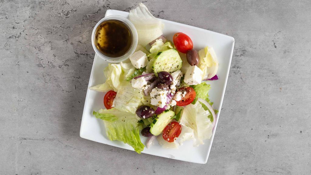 Greek Salad · Mixed greens, cucumbers, tomatoes, olives, red onions, and feta cheese.