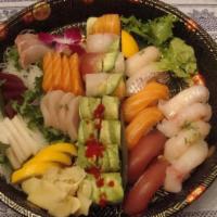 Sushi And Sashimi Lunch · 4 pieces of sushi and 7 pieces of sashimi and a spicy tuna roll. Served with miso soup and g...