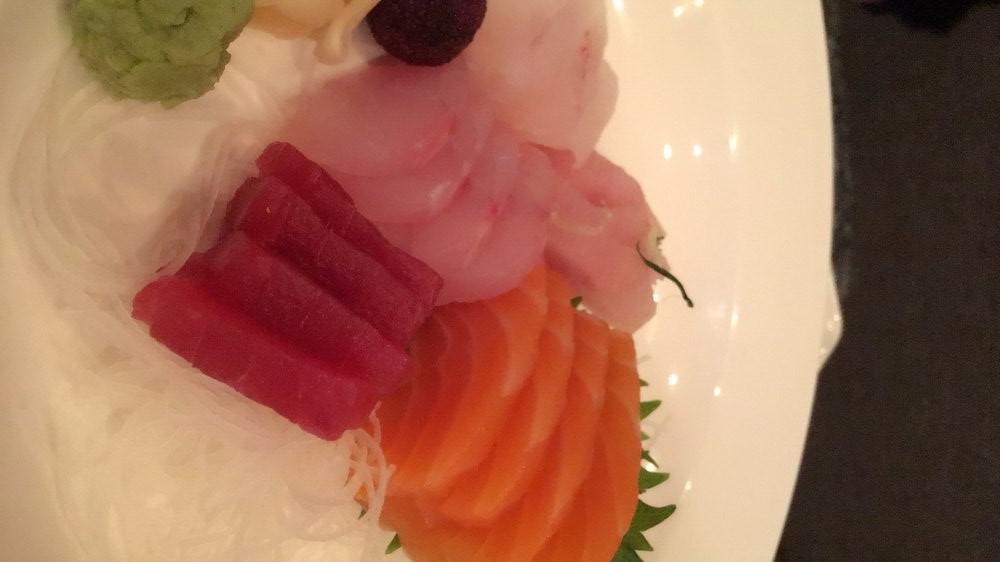 Sashimi Lunch · 12 pieces of assorted raw fish. Served with miso soup and green salad.
