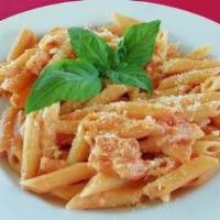 Penne · Penne pasta tossed in homemade sauce sprinkled with fresh basil.
