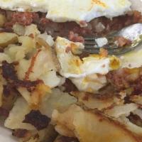 Corned Beef Hash & Eggs 2 Eggs · with Potatoes & Toast