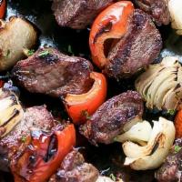 Lamb Kebab · Marinated boneless lamb, threaded onto skews and grilled.