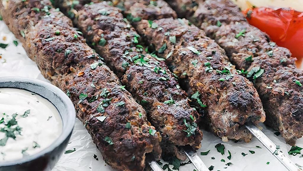 Kofta Kebab · Ground spiced beef skewers grilled through.