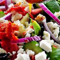 Mediterranean Crinkle Fries Salad · Diced cucumber , tomatoes , onion , feta cheese , olive oil mixed with our chef's secret ins...