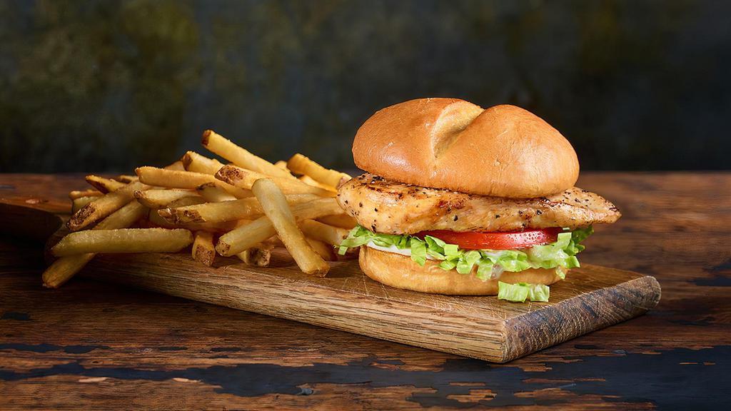 Grilled Chicken Sandwich Combo · Grilled chicken breast on a toasted bun with lettuce, tomato and mayo.  Add a slice of American or Cheddar Cheese.  Comes with a side of French Fries or Tater Tots, and a beverage.
