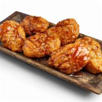 10 Boneless Wings · Boneless Wings tossed in your choice of sauce and served with ranch, blue cheese, or honey m...