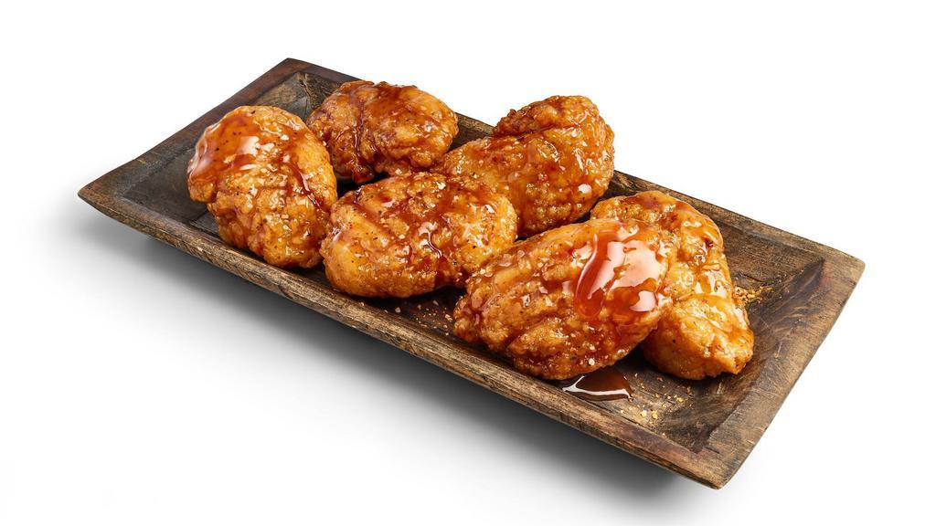 10 Boneless Wings · Boneless Wings tossed in your choice of sauce and served with ranch, blue cheese, or honey mustard.