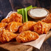 5 Bone-In Wings · Bone-in Wings tossed in your choice of sauce and served with ranch or blue cheese.