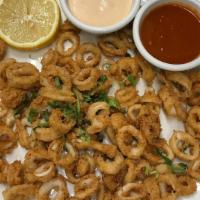 Calamares · Fried calamari with chipotle aioli sauce.