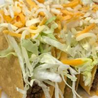 Taco Platter · Traditional crispy or soft with ground beef or chicken, lettuce and cheese.
