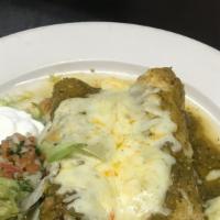 Enchilada Suiza · Soft corn tortilla, rolled and filled with chicken or pulled pork or cheese or ground beef o...