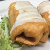 Chimichangas · Choice of chicken, or ground beef or pulled pork Wrapped in a crispy flour tortilla lightly ...