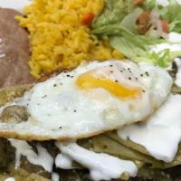 Chilaquiles · Salsa Verde tortilla casserole, topped with avocado, onion, cotija cheese, sour cream, fried...