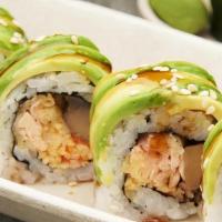 Tiger Roll · Tempura d salmon, spicy kani, portabella, and fried onion wrapped with avocado and topped wi...