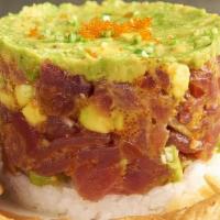 Tuna Tartar · Fresh magura tuna, flavored with a combination of spicy and savory seasonings, laid out on a...