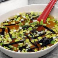 Miso Soup · Miso soup blended with red miso, white miso, and lightly diced veggies with marinated tofu a...
