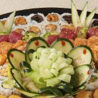 Large Platter · Chef choice of four fish specialty rolls, two vegetables specialty rolls, six fish sushi rol...