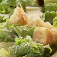 Caesar Salad · Crisp Romaine Lettuce tossed with a Creamy Caesar Dressing and topped with Homemade Garlic C...