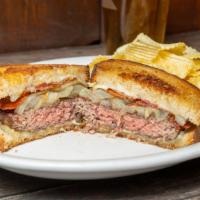 Swiss Patty Melt Burgers · Topped with Swiss cheese and sautéed onions on buttery rye toast.