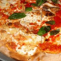 Margherita Pizza · Fresh mozzarella, plum tomatoes, fresh basil.