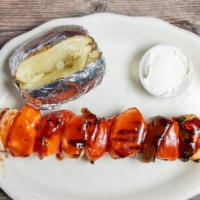 Bbq Chicken On A Stick · Skewered with peppers, onions and tomatoes and basted with BBQ sauce.