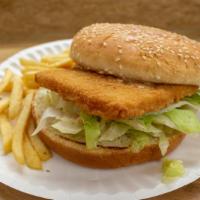 Fish Sandwich Combo · With French fries and can of soda.