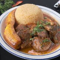 Seco De Chivo (Arroz Y Maduro Frito) · Goat stew  with rice and fried sweet plantain