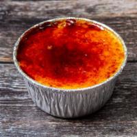Crème Brûlée · Creamy baked custard with a touch of  vanilla. topped with a layer of caramelized sugar...