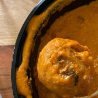 Malai Kofta · Vegetables and cheese dumpling in a nutty tomato creamy sauce.