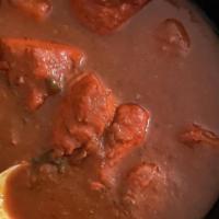 Chicken Vindaloo · Chicken cooked with a fiery combination of freshly roasted spices and potato.