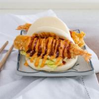Shrimp Bun · Most popular.Two pieces. Steamed bun with tempura shrimp, lettuce, spicy mayo, and okonomi s...