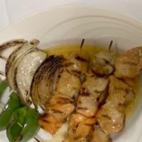 Pinchos De Pollo Con Arroz · Chicken Kabobs served with Rice
