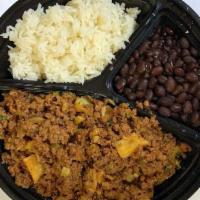 Carne Molida · Ground beef with diced onions, vegetables, potatoes, and tomato sauce; served with rice & be...