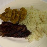 Ny Steak · Grilled to perfection; served with tostones & rice