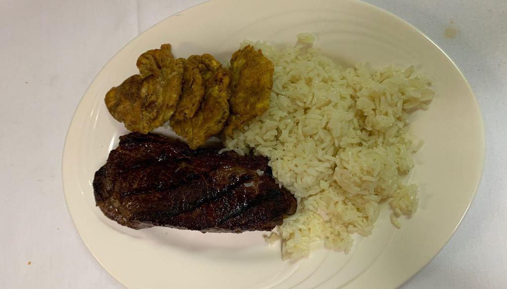 Ny Steak · Grilled to perfection; served with tostones & rice