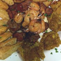 Picada Don Pedro · Chicken, chorizo, shrimp, chopped pupusas, tostones, and fried pork