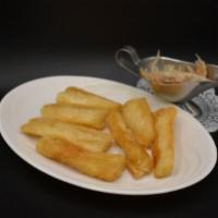 Yuca Frita (Fried Cassava) · Fried cassava (potato-like starchy vegetable)