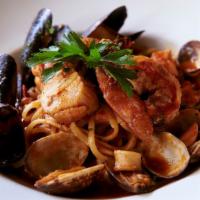 Pescatore · Linguine, Mussels, Fresh Fish, Calamari, Jumbo Shrimp, Scallop, Light Spicy Tomato Sauce