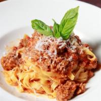 Double Bolognese · Fresh Tagliatelle Pasta, Veal, Pork & Beef, Tomato sauce