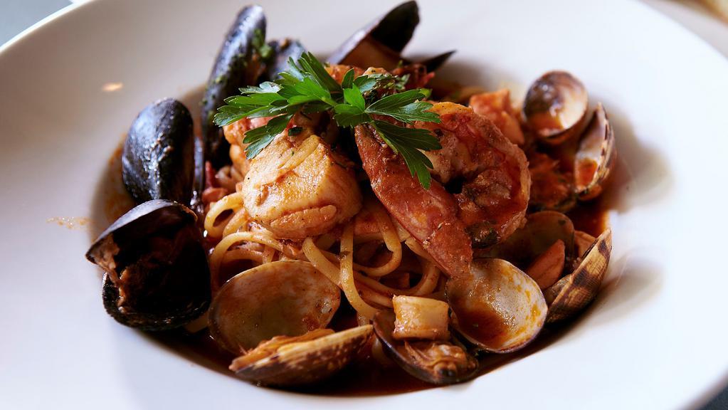 Double Pescatore · Linguine, Mussels, Fresh Fish, Calamari, Jumbo Shrimp, Scallop, Light Spicy Tomato Sauce