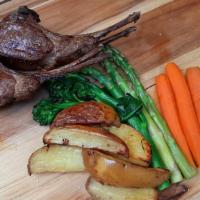 Lamb Chops · grilled double chops marinated in extra virgin olive oil, fresh herbs, seasonal vegetables