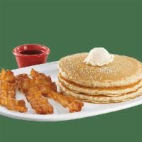 Buttermilk Pancakes · 3 fluffy buttermilk pancakes. Add applewood-smoked bacon, sausage or turkey bacon for an add...