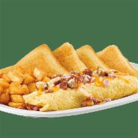 Meat Lover'S Omelette · Filled with crispy bacon, ham, sausage and Monterey jack & cheddar cheese.
