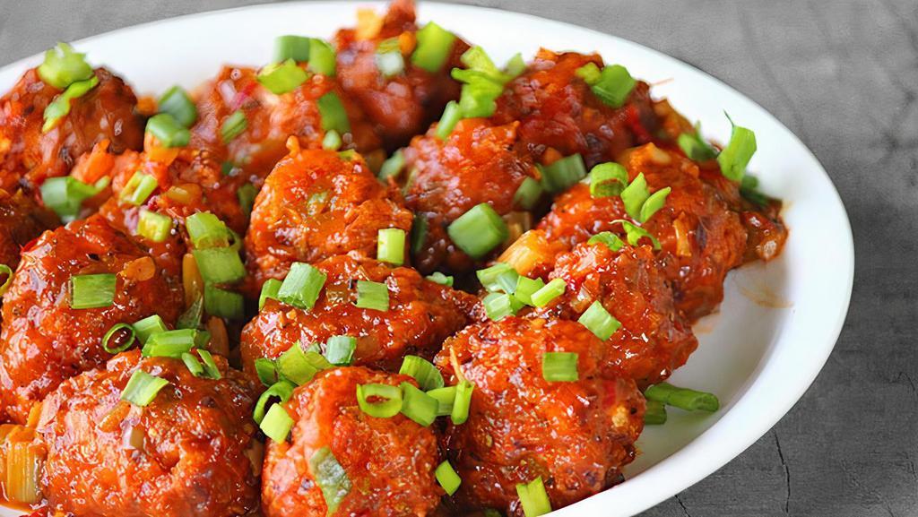 Mix Manchurian · Vegetable manchurian is one of the popular recipes from Indo chinese cuisine. Veg manchurian is made by tossing fried mixed veg balls in sweet, sour and hot manchurian sauce.