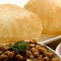 Chole Puri · Chole Puri Recipe is the famous North Indian Snack Dish.  Chole(chickpea) are cooked in Grav...