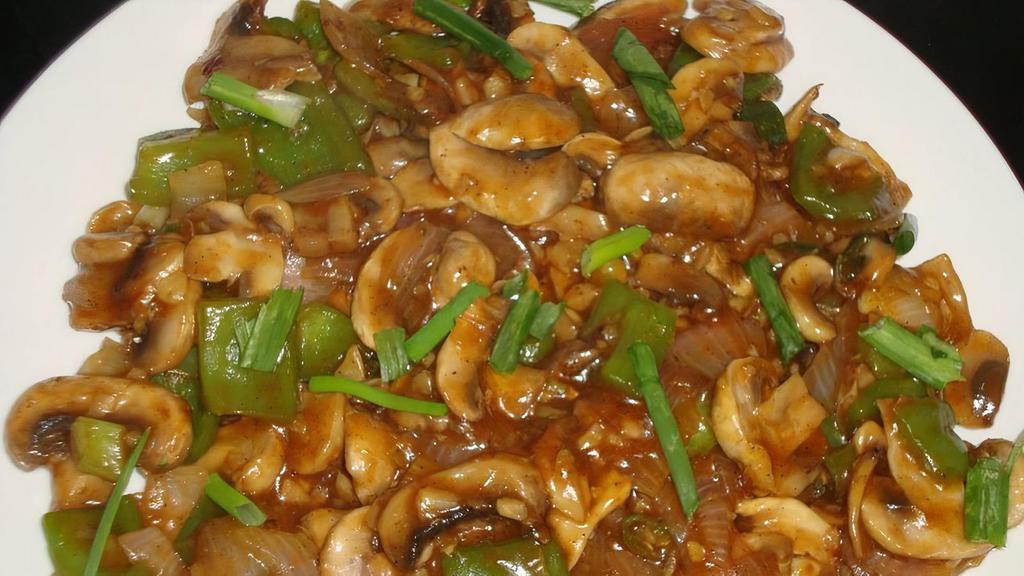 Mushroom Chili · chilli mushroom is a simple dish made of stir fried mushrooms with chilli sauce. Serve as an appetizer or side with rice