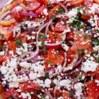 The Horiatiki Greek Village  Pitza · Tomato Sauce Base With Fresh Tomatoes, Onions, Capers, Kalamata Olives, Oregano, Feta Cheese...