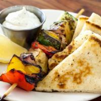 Veggie Skewer · Vegetarian, gluten-free. Eggplant, zucchini, colored peppers, and red onion. Served with tza...