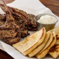 Lamb Chops · Gluten-free. Served with pita and tzatziki. Charcoal grilled and marinated with Greek salt a...