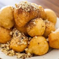 Loukoumades: Fried Dough Drizzled With Honey, Walnuts & Cinnamon · 